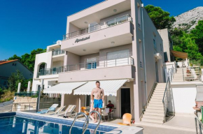 Family friendly apartments with a swimming pool Brela, Makarska - 13592